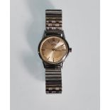 A vintage 1960's Roamer waterproof wrist watch having a silvered dial with baton numerals to the