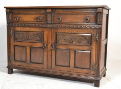 A good quality Jaycee Old Colonial oak sideboard. Raised on squared legs with twin cupboard under
