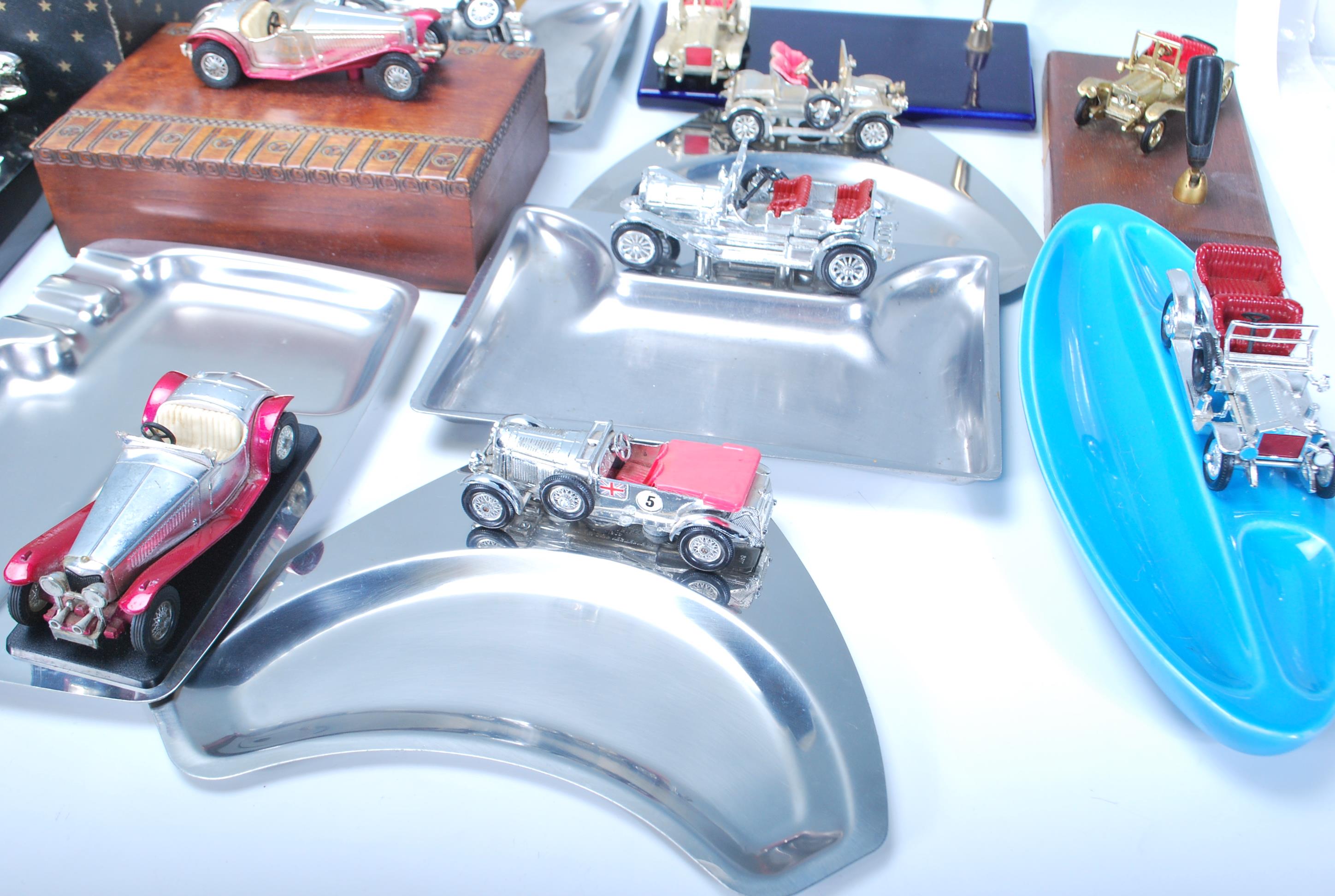 A large collection of Matchbox Vintage toy car topped ashtrays, trinket boxes, pen holders, pipe - Image 8 of 10