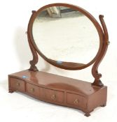 A 19th Century mahogany swing / toilet mirror havi