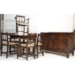 A mid century Ercol solid oak Old Colonial dining room suite. To include sideboard, draw leaf /