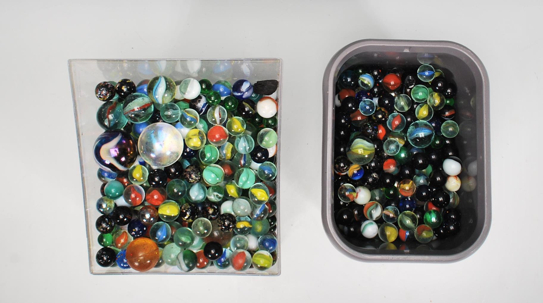 A large collection of vintage marbles of varying ages, designs and sizes. Designs include onion