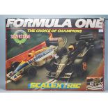 A vintage Scalextric Formula One F1 ' The Choice of Champions ' boxed set.