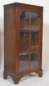 A Queen Anne revival mahogany pedestal bookcase ca