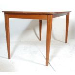 A retro 20th Century Danish inspired teak two leaf draw-leaf extending dining table, the rectangular