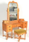 A large and impressive Victorian style oak dressing table, drop centre mirror raised on turned