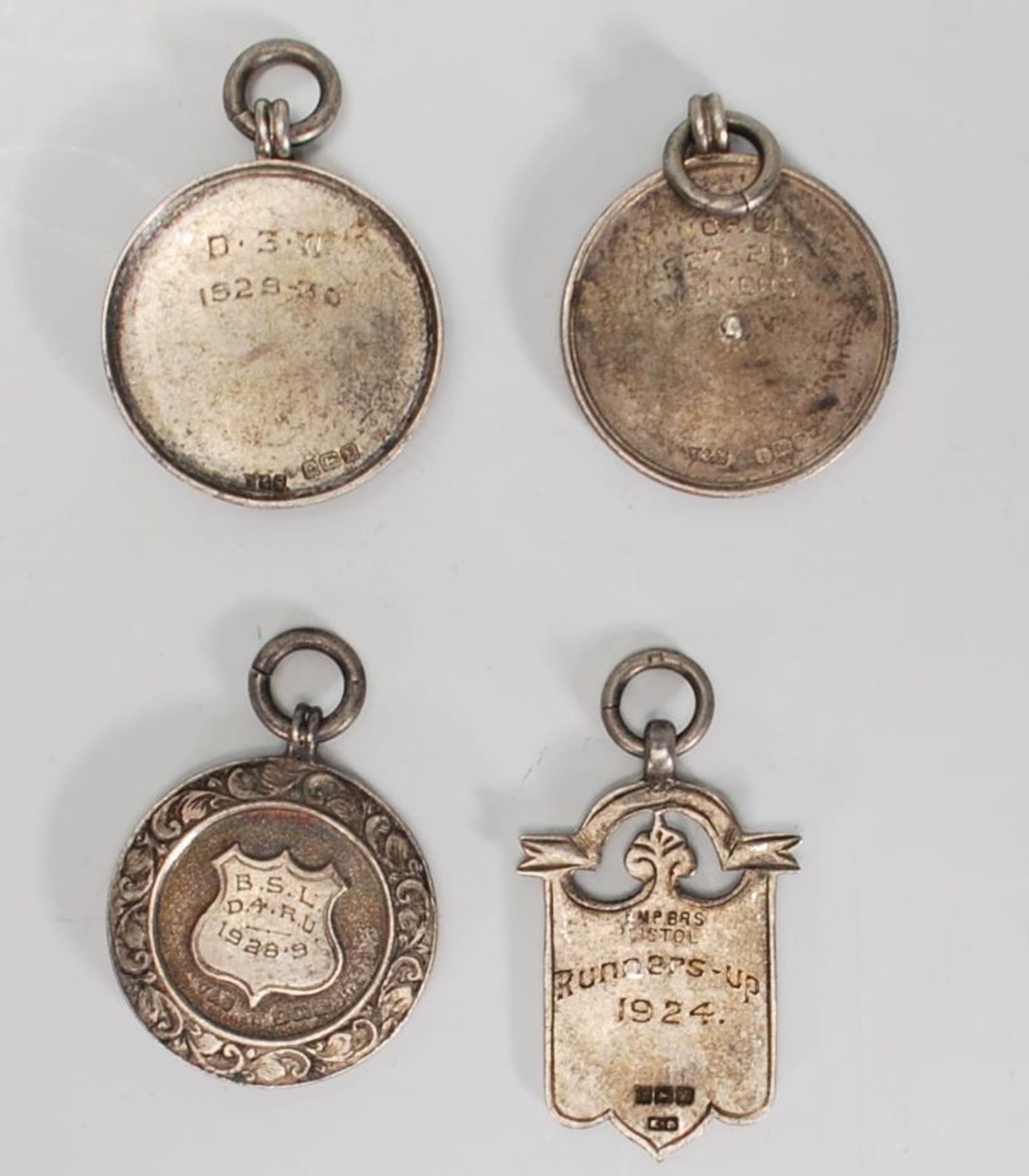 A group of four silver hallmarked early 20th Century Art Deco 1920's fob medals to incldue - Bild 2 aus 2