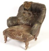 A 19th Century antique vintage Howard style faux leather button backed chair / armchair having