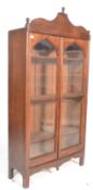A 19th century Victorian and later mahogany library bookcase cabinet. Raised on squared legs with