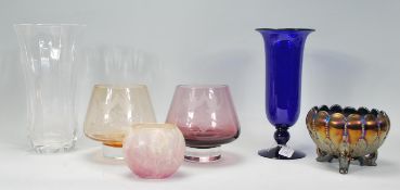 A small group of mixed glassware to include an early 20th Century heavy crystal glass vases, two