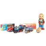 COLLECTION OF VINTAGE BATTERY OPERATED AND CLOCKWORK TOYS