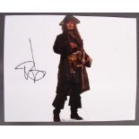 JOHNNY DEPP - PIRATES OF THE CARIBBEAN SIGNED 8X10" PHOTO