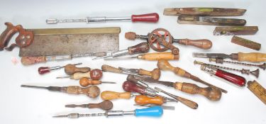 A good selection of antique / vintage woodworking and other tools to include a brass mounted saw,