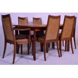 A vintage retro G Plan 1970's dining suite to include a teak extending dining table, the table top