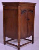 An early 20th Century oak cased Edwardian upright gramophone by Westminster. The cover atop opens to