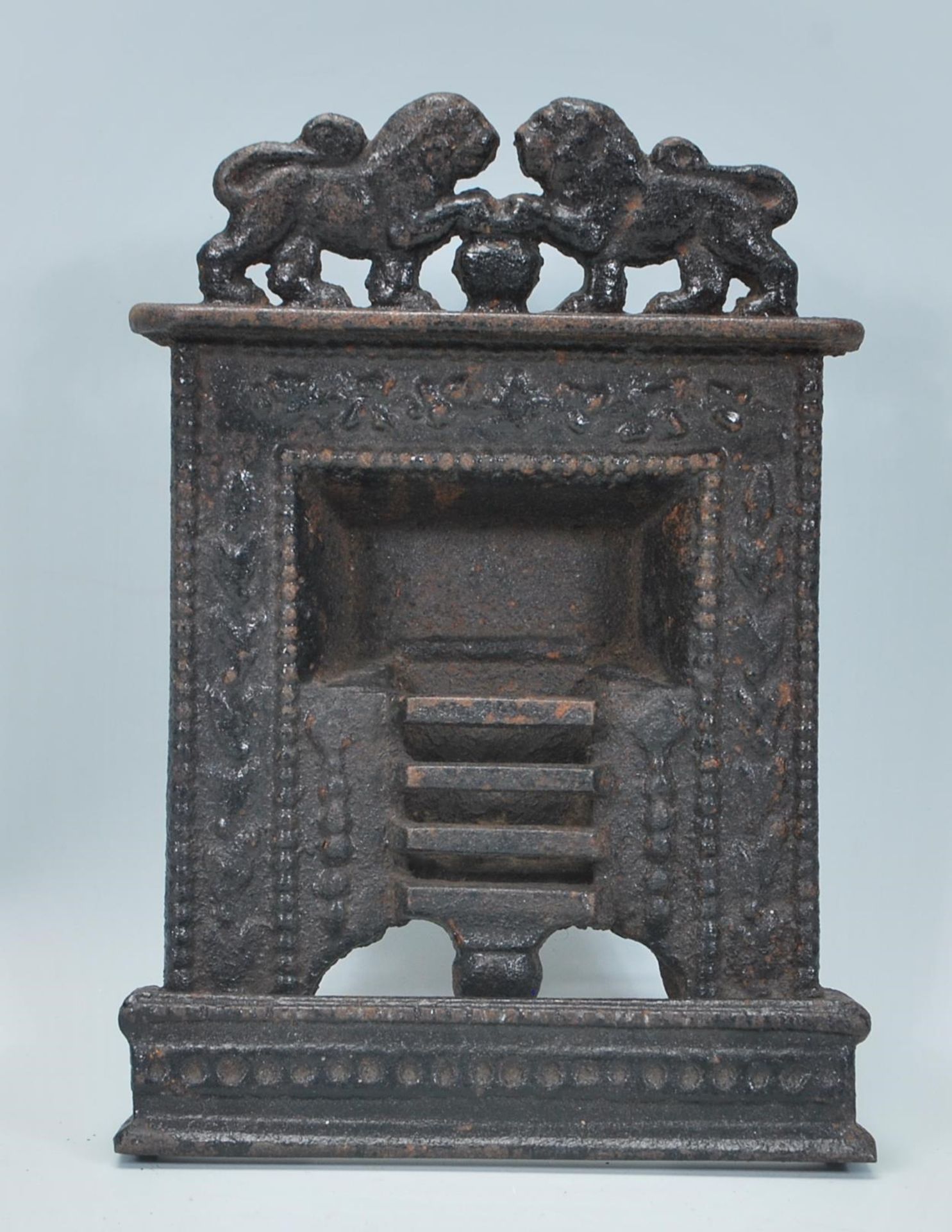 A 19th Century Victorian cast iron miniature tradesman's sample / novelty door stop in the form of a