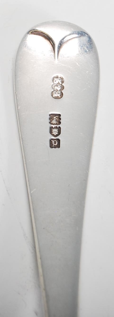 A silver hallmarked serving ladle spoon of usual form, London assay with makers mark for Reid & Sons - Image 3 of 6