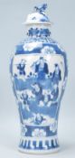 A 19th Century Chinese lidded vase of baluster form having a hand painted blue and white prunus