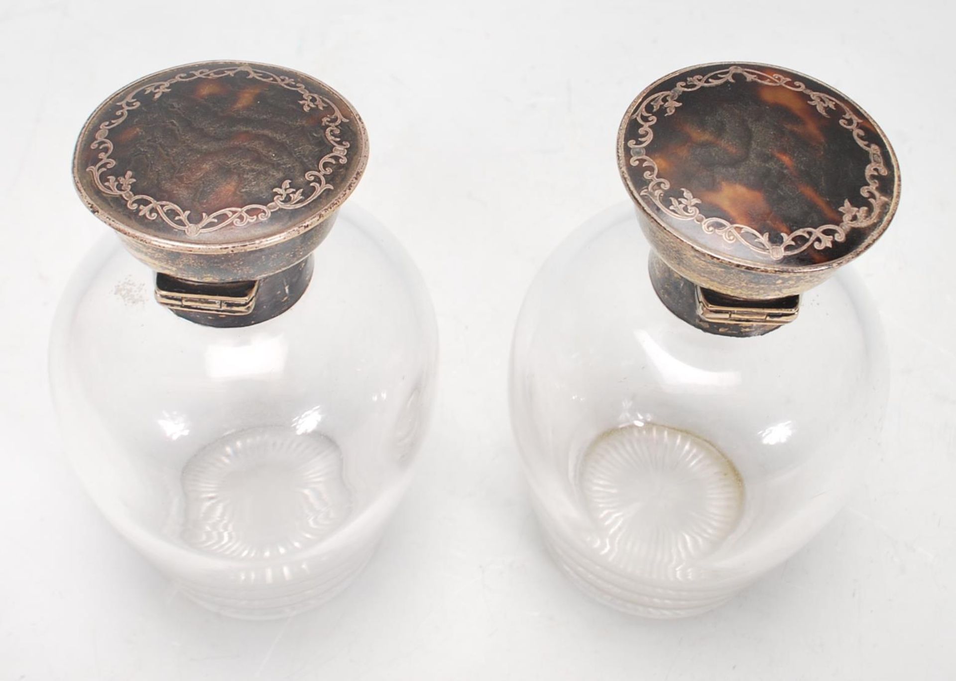 A pair of silver topped dressing table perfume bottles, each lid of round form set with tortoise - Image 4 of 5