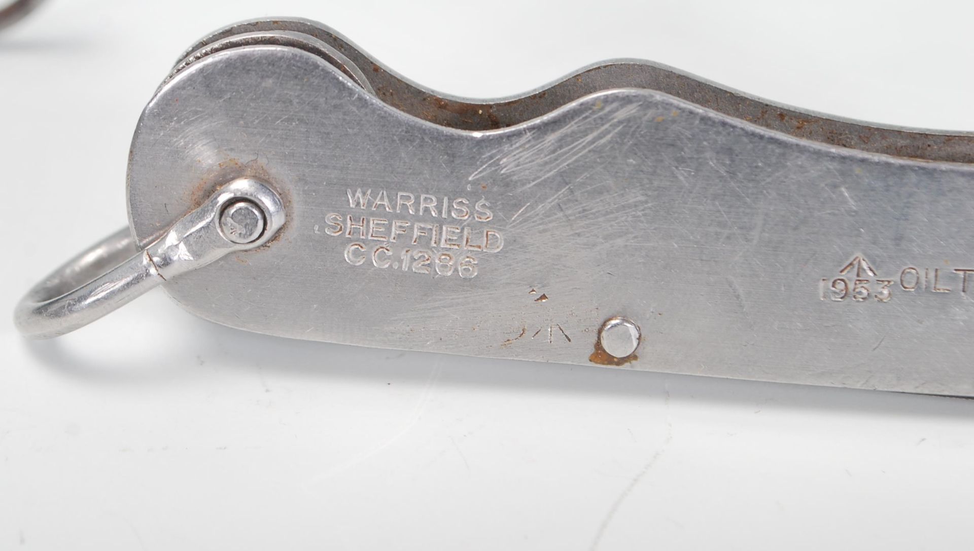 A military issue Warriss of Sheffield pocket knife marked 1953 with broad arrow and Oil the - Image 8 of 9