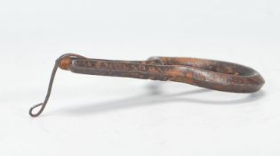 A 19th Century musical instrument jew's harp / mouth harp of metal construction. Measures 5 cm x 9