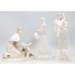 A good group of three Lladro porcelain figures to include a lady with a young calf, a man carrying a