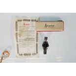 A 1960s Gentleman's Accurist 21 Jewel Shockmaster wristwatch with a jet black face and baton