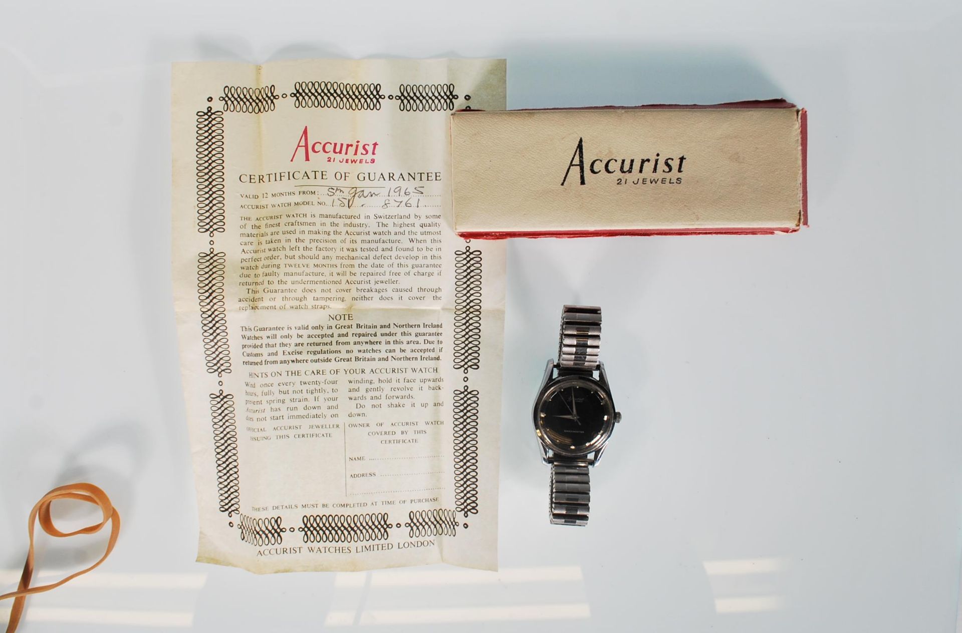 A 1960s Gentleman's Accurist 21 Jewel Shockmaster wristwatch with a jet black face and baton