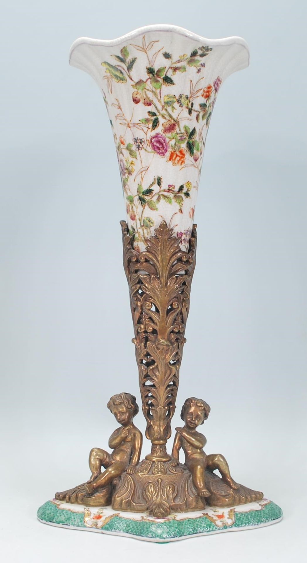 A 20th Century William Lowe centerpiece vase, the vase of tapering form with a fanned rim with