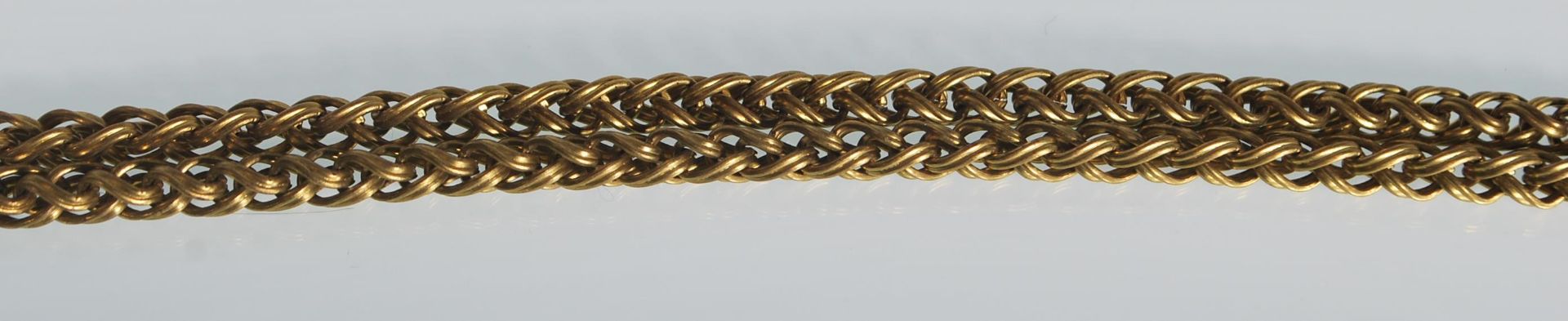A 20th Century brass guard watch chain with woven links and a spring ring clasp. Measures: 62 - Bild 2 aus 5