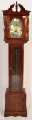 A 20th Century Tempus Fugit long case grandfather clock having a mahogany case having a broken