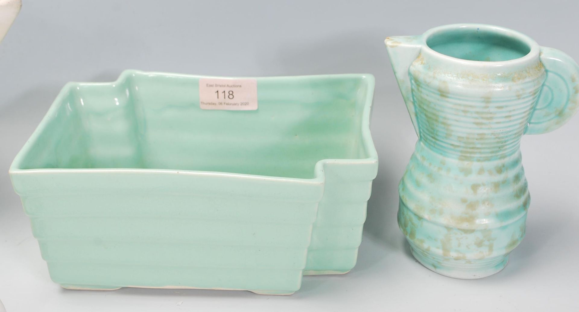 A small group of early 20th Century Art Deco ceramics to include a mint green table vase, a small - Image 4 of 6