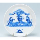 A 19th Century Chinese porcelain dish of round form having painted in blue and white depicting the