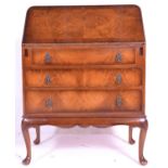 A mid century burr walnut Queen Anne revival ladies bonheur de jour / writing bureau desk being