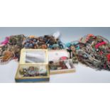 A large collection of costume jewellery to include necklaces, chains, bracelets, watches, beads,