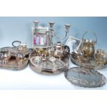 A selection of vintage silver plated items dating from the early 20th Century to include a three
