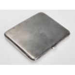 A silver hallmarked S Blanckensee & Son cigarette case having engine turned decoration to the