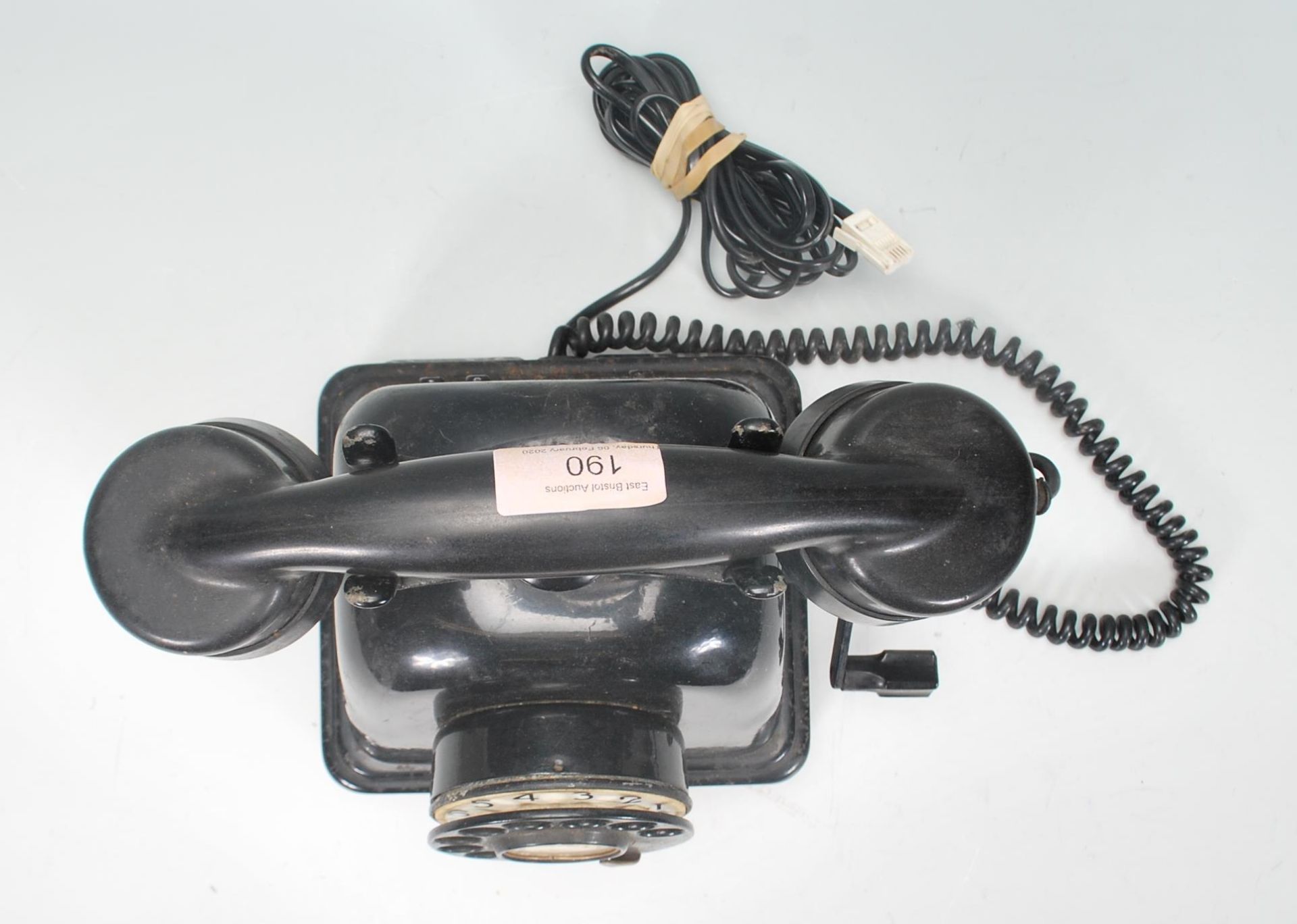 A vintage retro mid Century early plastic telephone having a domed body with rotating dial and - Bild 4 aus 5