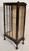 A 1930's Queen Anne revival mahogany glass display cabinet vitrine having a single glazed door