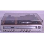 A retro 20th Century Sanyo Stereo Music System Model G 3003, having tape player / recorder, record