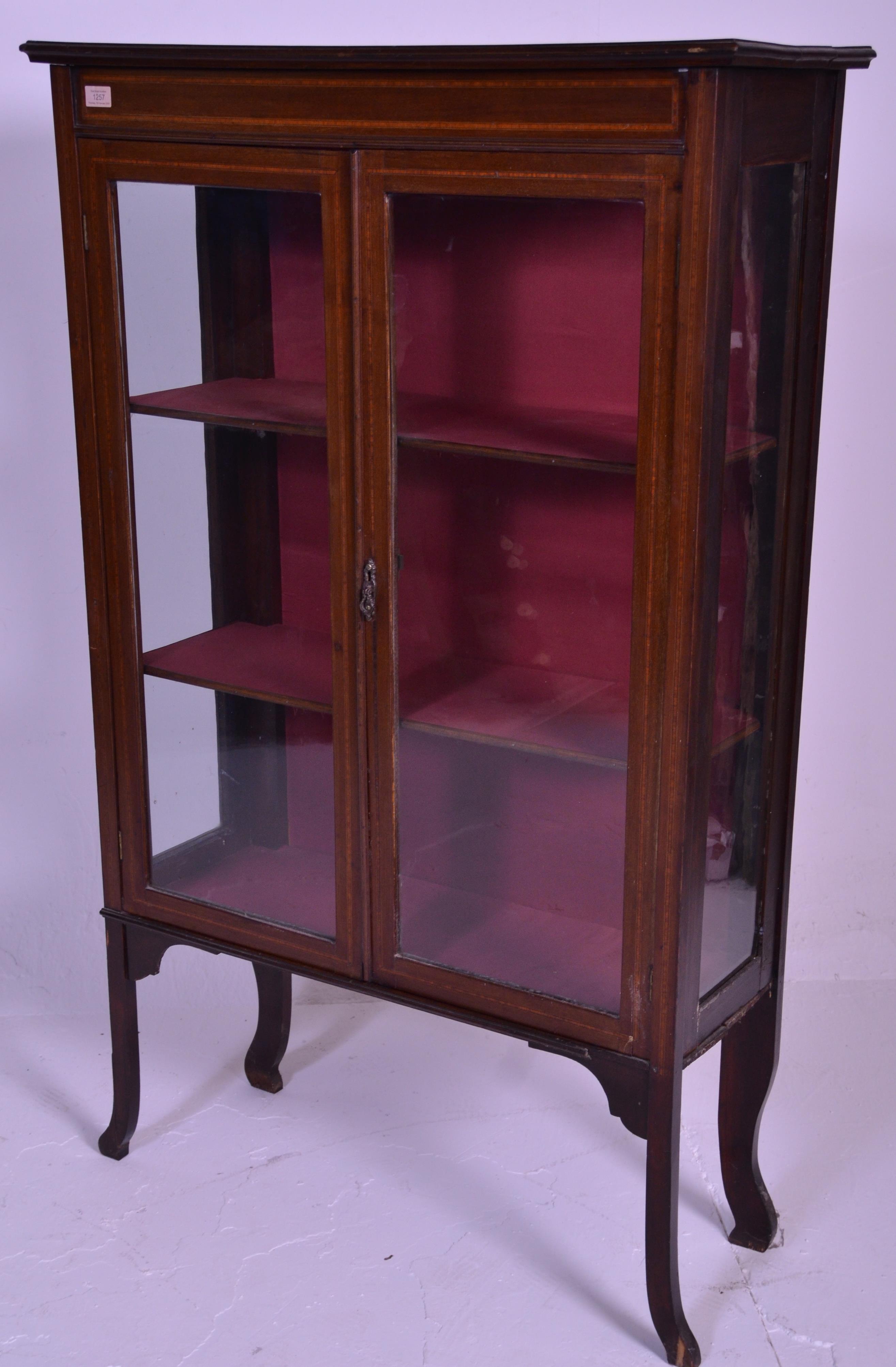 An early 20th Century inlaid mahogany display cabinet / bookcase raised on shaped supports with twin - Image 6 of 6