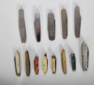 A collection of vintage 20th Century fruit knives to include some advertising examples, celluloid