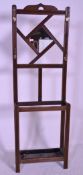 A Victorian 19th century mahogany hall stand / umbrella stand. Raised on squared legs with a