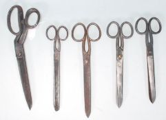 A group of five large vintage early 20th Century industrial shop / haberdashers /  tailors scissors.