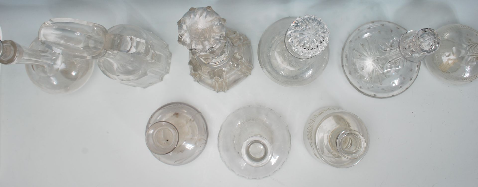 A good collection of mixed decanters dating from the 19th Century Georgian era to include a bell - Image 4 of 7