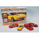 A good collection of vintage 20th century diecast car models to include examples: Ferrari 365 GTB4