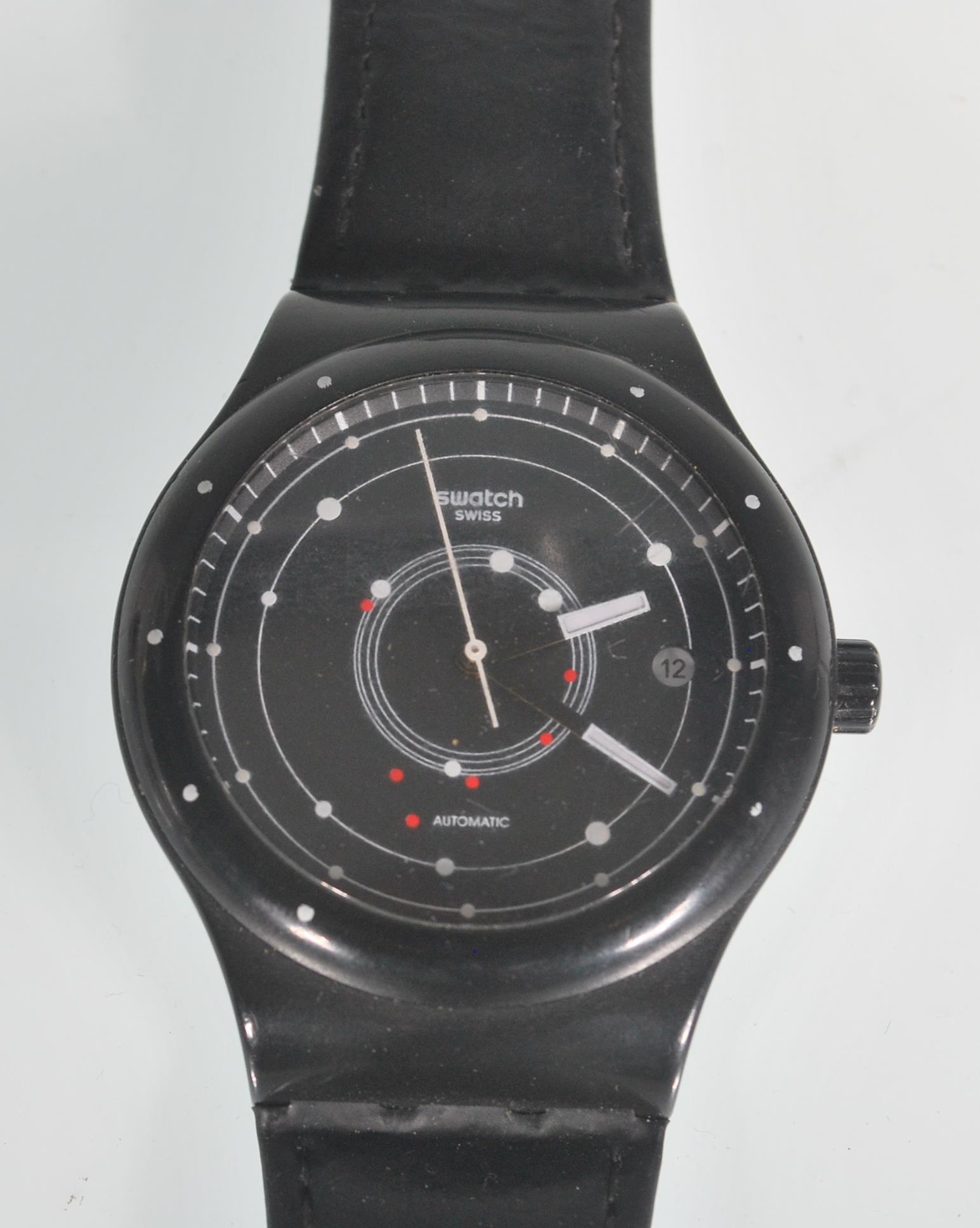 A Swatch Swiss Automatic wrist watch having a black face with a satellite design dial and date - Image 2 of 4