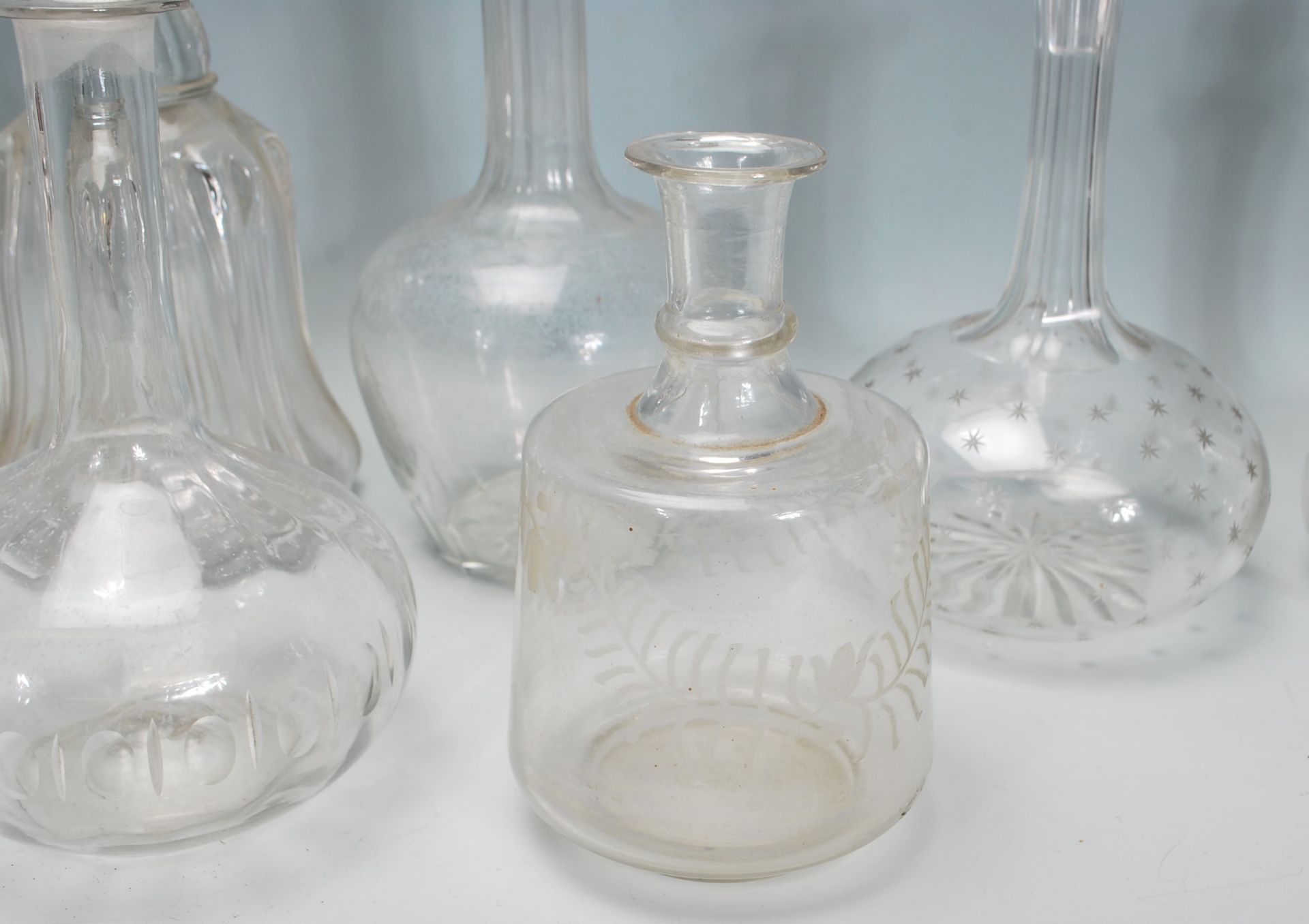 A good collection of mixed decanters dating from the 19th Century Georgian era to include a bell - Image 3 of 7