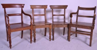 A Regency North Country oak carver armchair raised on turned supports with scroll shaped armrests