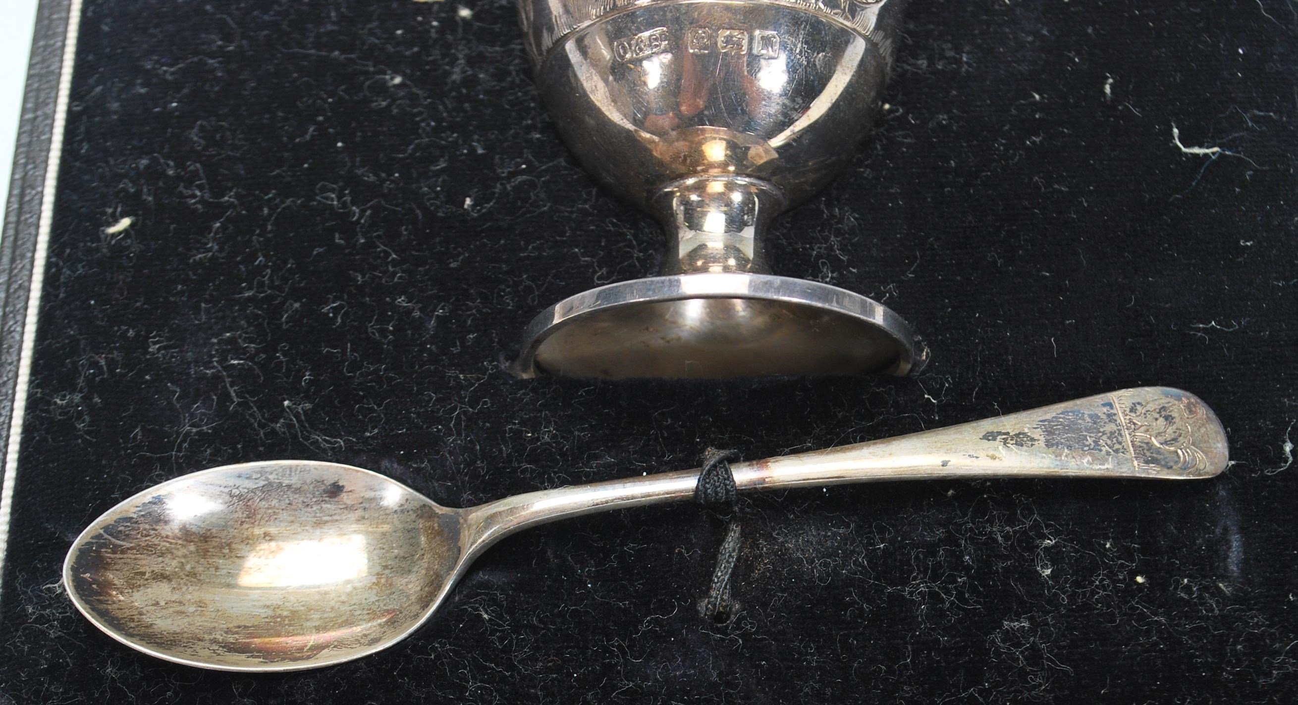 A silver hallmarked engraved child's egg cup and spoon christening set, the spoon and cup each chase - Image 6 of 8